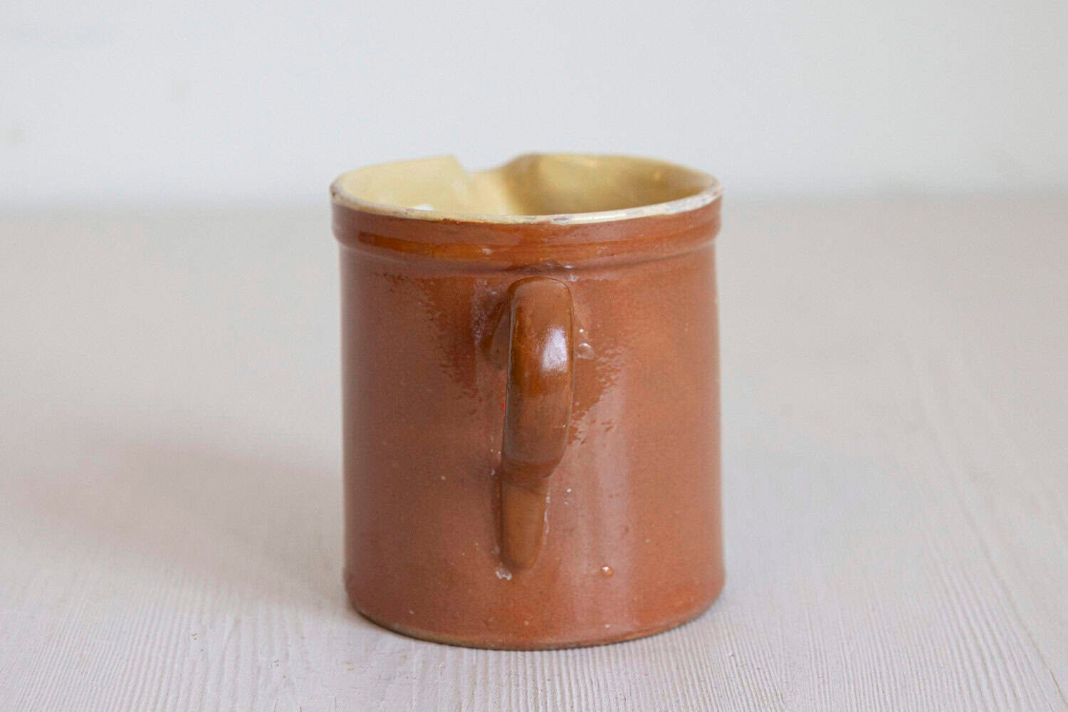 French 19th Century Redware Pitcher with White Flower Decor - JAA