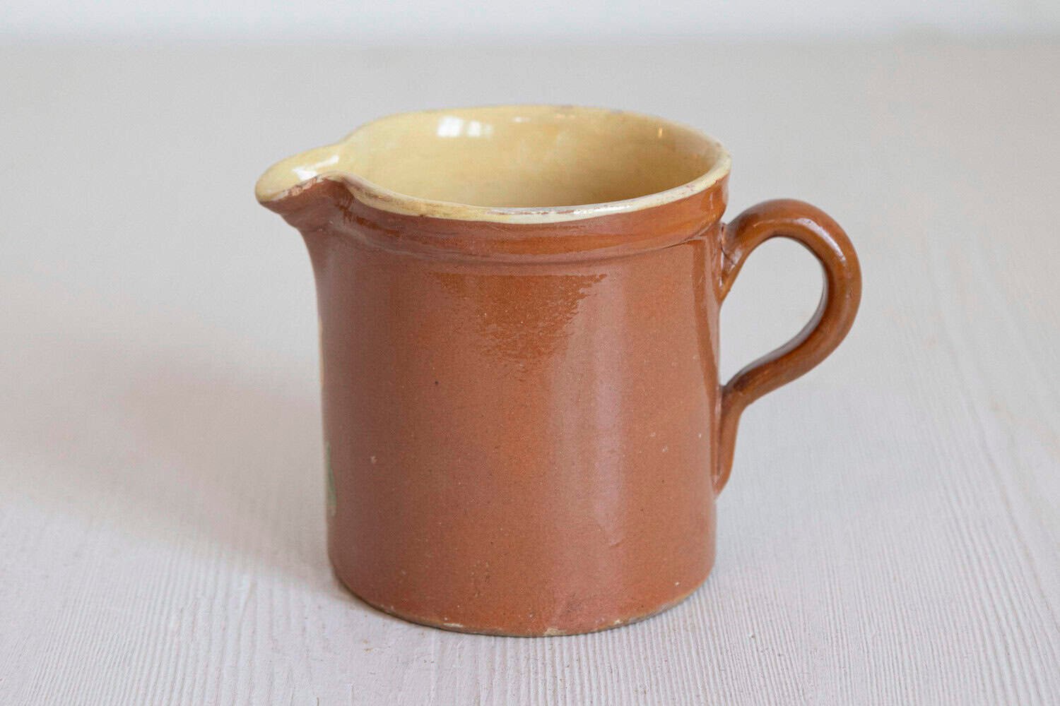 French 19th Century Redware Pitcher with White Flower Decor - JAA