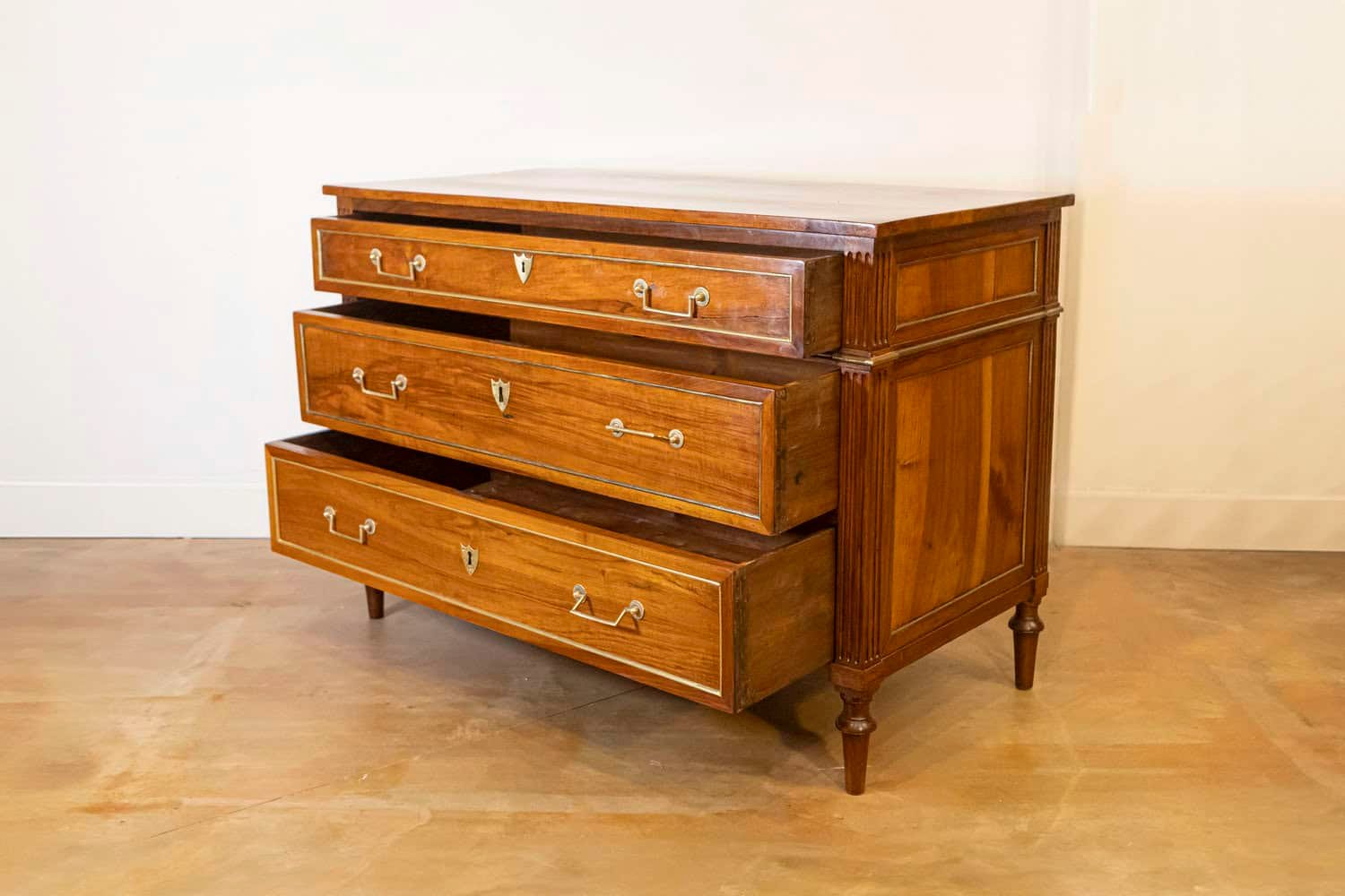 Louis XVI Style 1890s Commode with Graduated Drawers and Brass Hardware - JAA