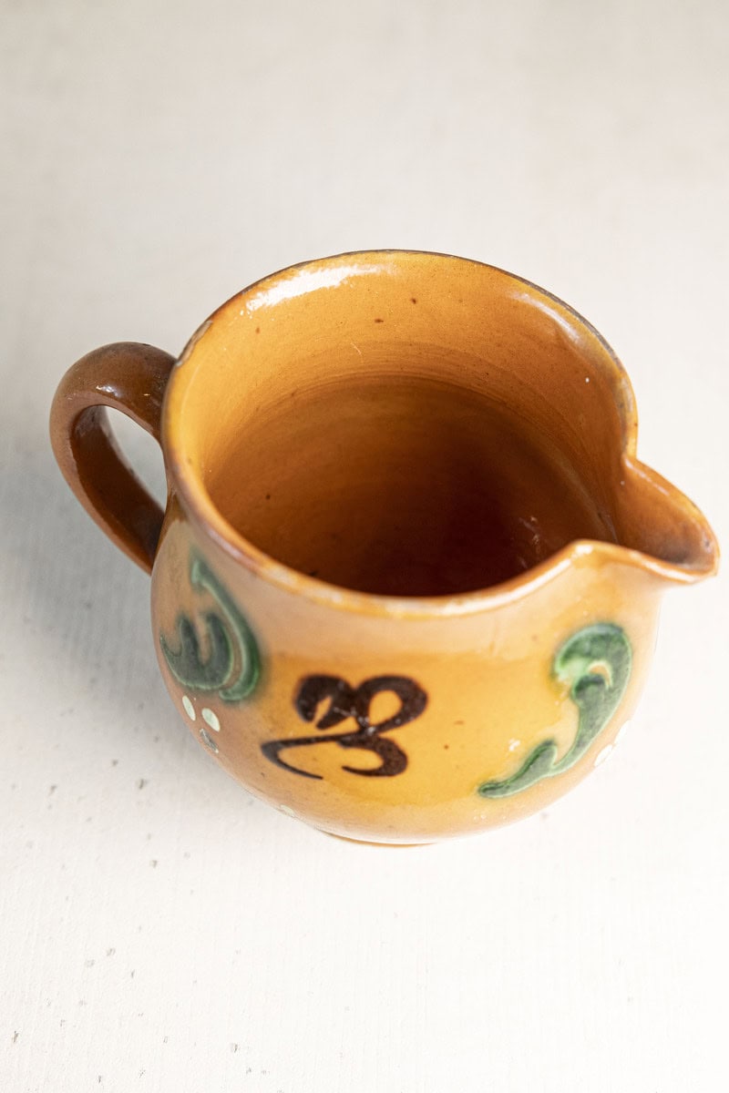 Early 20th Century French Glazed Terracotta Miniature Pitcher with Folk Slip Decoration - JAA