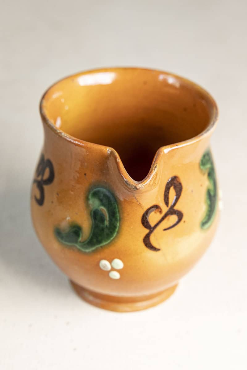 Early 20th Century French Glazed Terracotta Miniature Pitcher with Folk Slip Decoration - JAA
