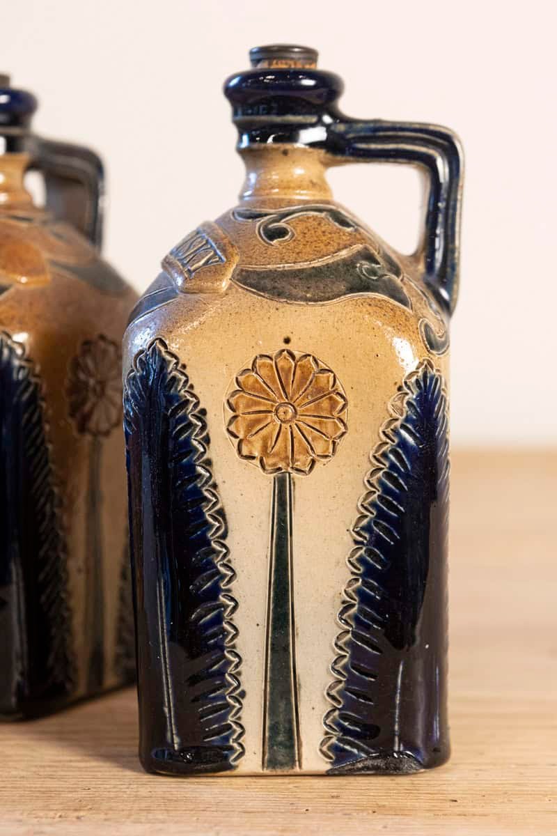 Two Victorian English Pottery Decanters in Tantalus-Inspired Wicker Basket - JAA