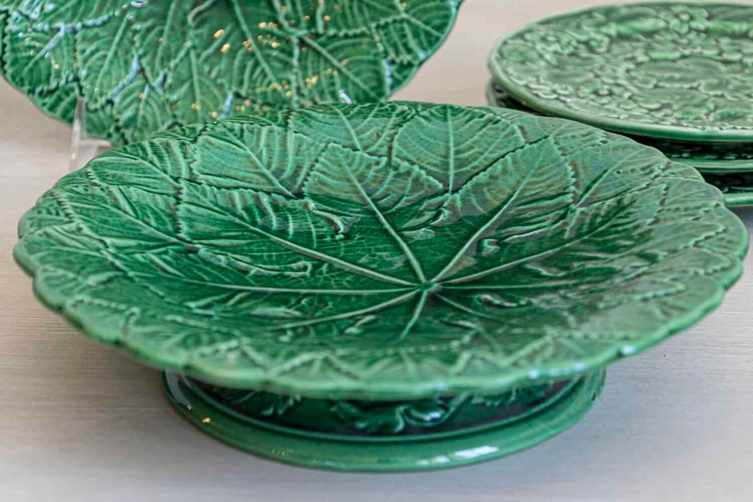Set of Nine Green Glazed Porcelain Pieces with Eight Plates and Single Compote - JAA