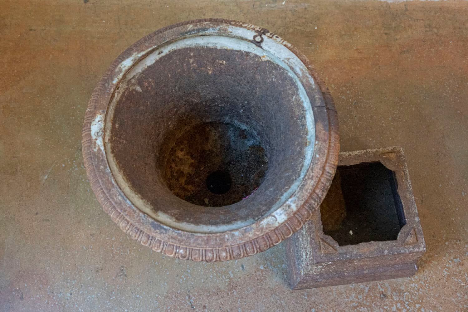 Pair of French 19th Century Iron Médicis Vases on Stepped Pedestals with Patina - JAA