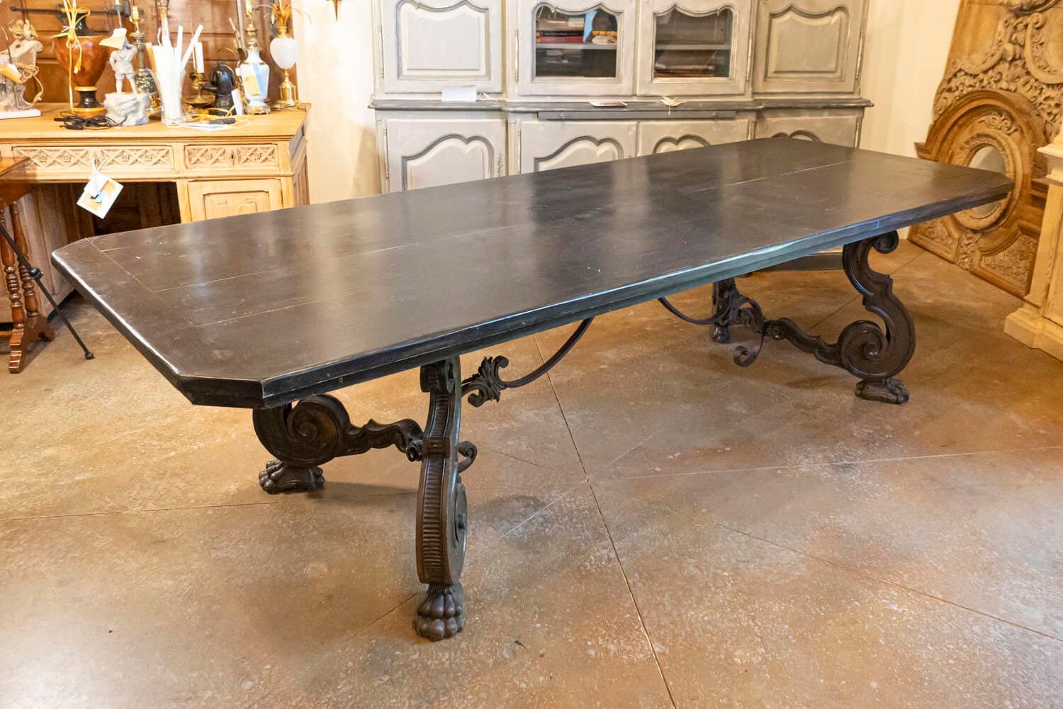 Italian 1920s Ebonized Walnut Dining Table with Carved S-Scroll Legs on Paw Feet - JAA