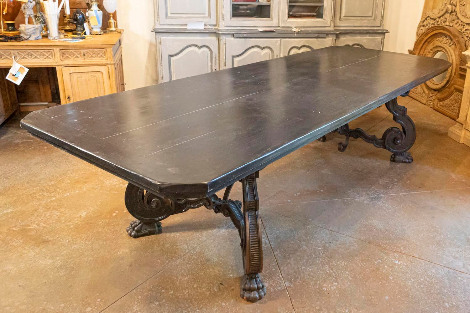 Italian 1920s Ebonized Walnut Dining Table with Carved S-Scroll Legs on Paw Feet - JAA
