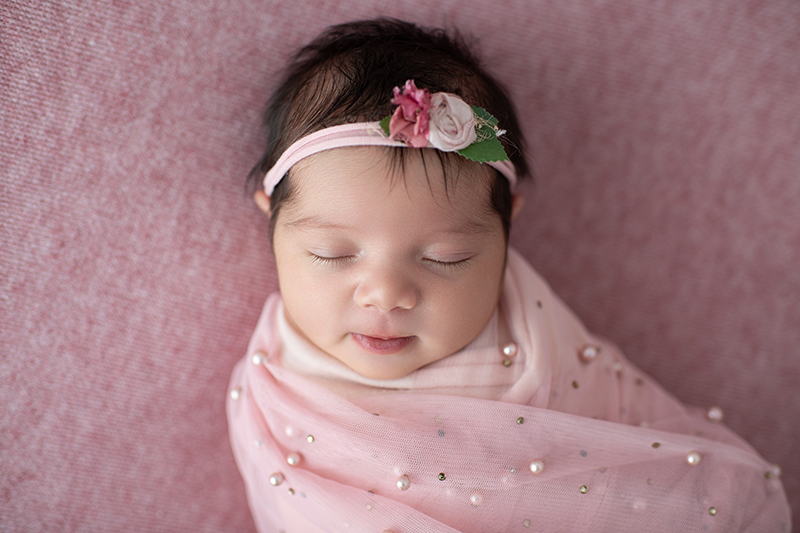 beautiful luxury beaded swaddle on baby girl in my frederick newborn studio