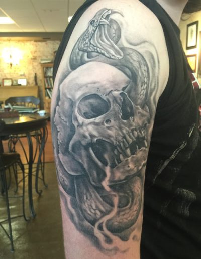 skull and snake tattoo , realistic tattoo st augustine , skull tattoo st augustine , skull tattoo florida , tattoo artist florida