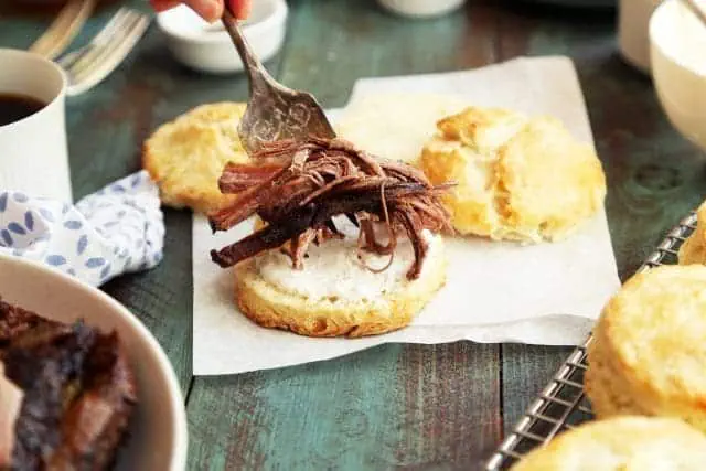 Brisket Breakfast Biscuits with poached egg and horseradish sauce