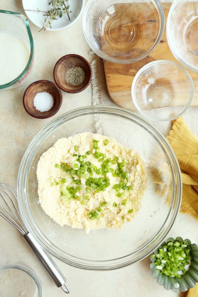 scallions going into cornbread batter 