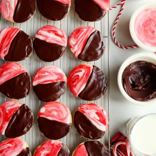 chocolate peppermint black and white cookies on a cooling rack