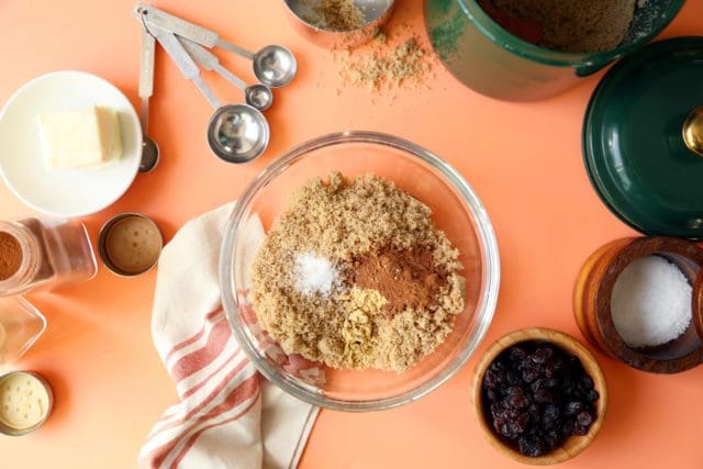 Cinnamon roll filling in a bowl: brown sugar, cinnamon ginger, and salt.
