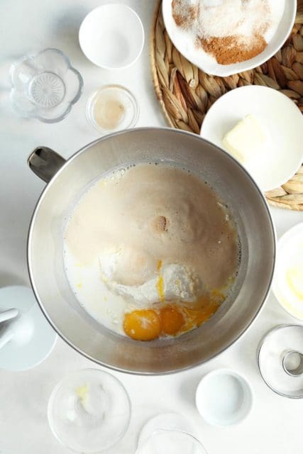 All ingredients in a mixing bowl for doughnuts.