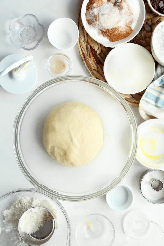 doughnut dough in a glass bowl.