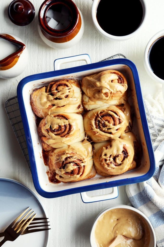 baked overnight cinnamon rolls in a baking dish for serving