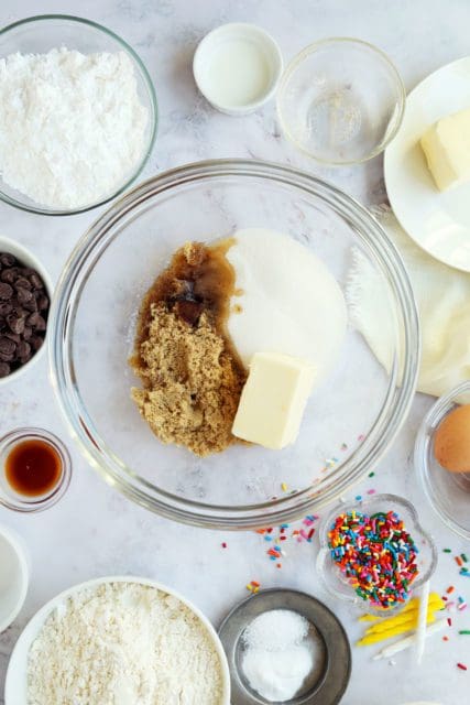 Butter, sugars, and browned butter in a bowl to cream
