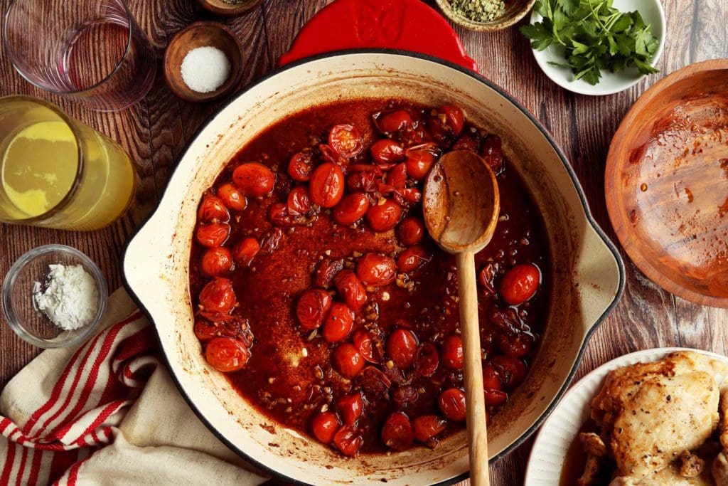 Roasted tomatoes and win added to Marry Me Chicken pot.