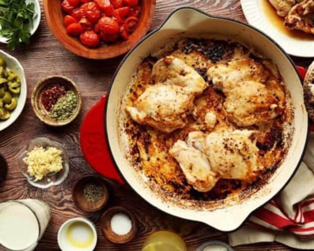 Chicken thighs for Marry Me Chicken browned in a cast iron skillet.