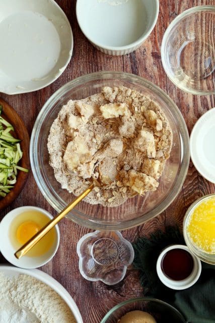 oat crumble topping with butter bits in medium bowl