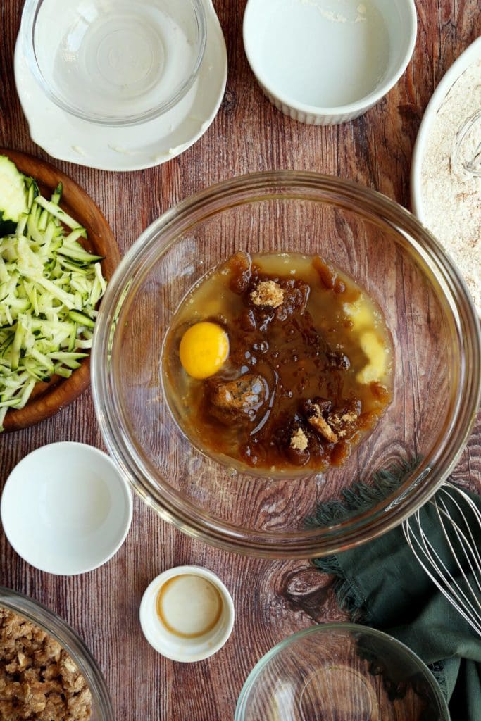 Sugar, eggs, and oil for coffee cake recipe in medium bowl.