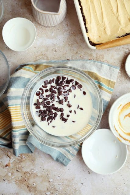 hot cream over chocolate chips for chocolate ganache