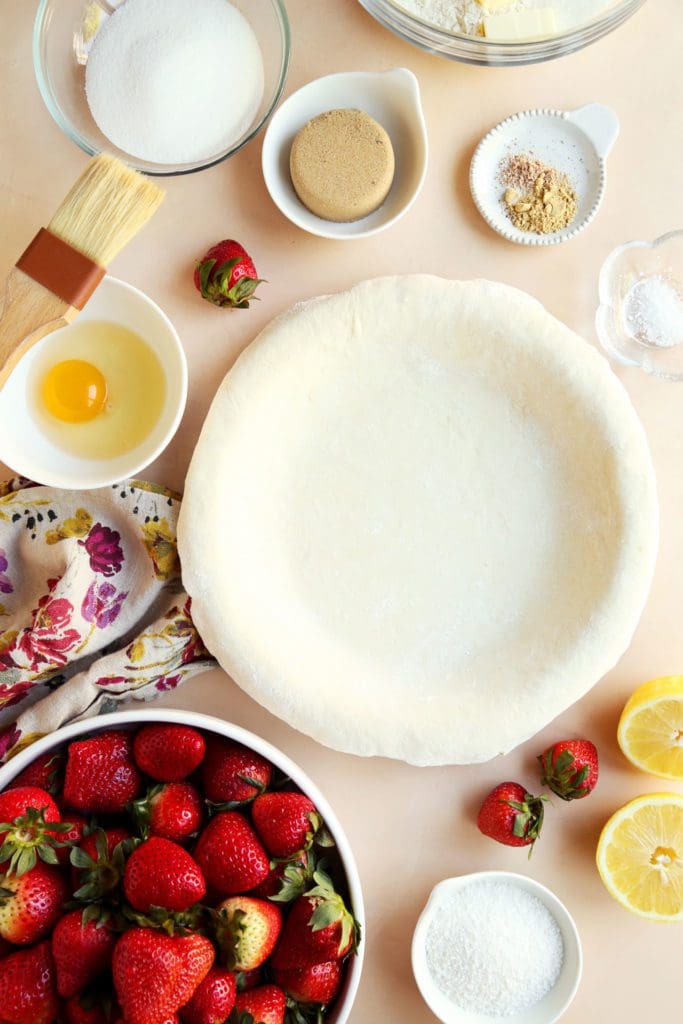 All butter pie crust rolled into a pie dish.