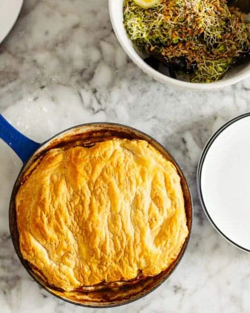 Baked puff pastry in cast iron pan.