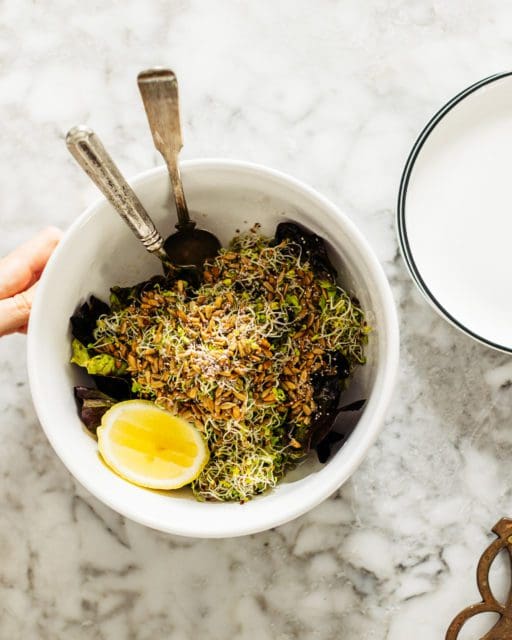 Salad in a bowl to serve with tomato pie recipe.