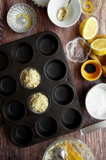 Muffin batter added to pan.