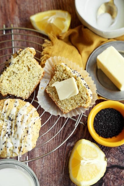 Muffin cut in half with a pat of butter.