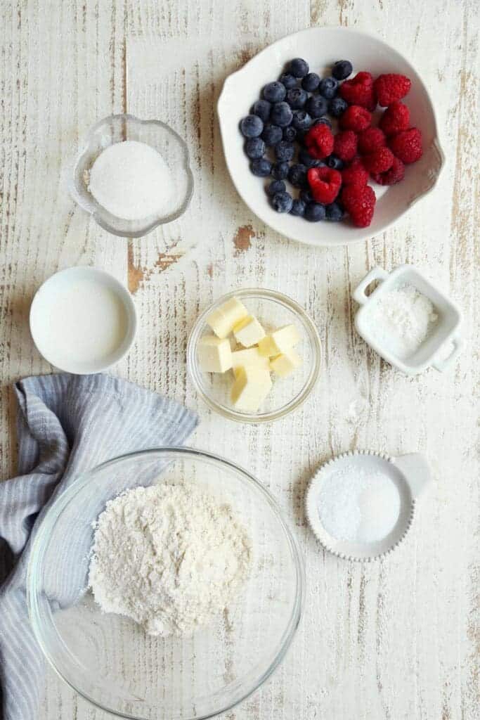 ingredients for berry crostata in smal bowls.