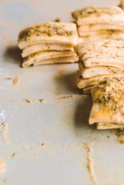 Stacked dough squares.