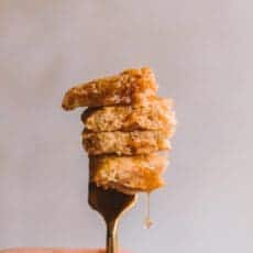 wedge of sweet potato pancakes on a fork