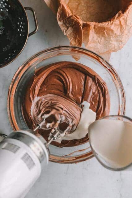 Beating cream into cheesecake batter