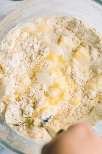 Mixing orange rolls dough