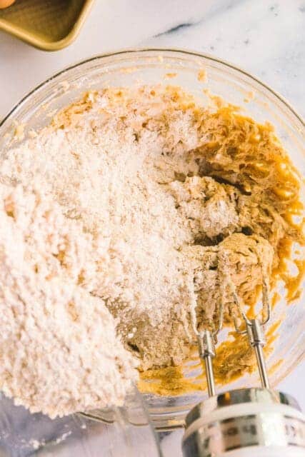 mixing flour into cookie dough