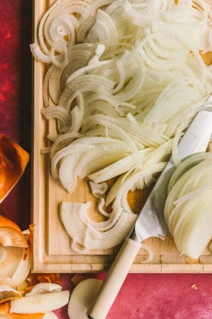 thinly sliced onions waiting to be caramelized for French onion chicken recipe