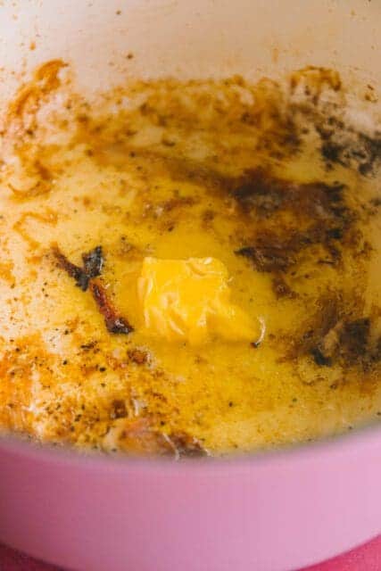 melting butter in a pot for French onion chicken recipe