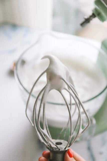close up of a stiff egg white peak to be put in cake