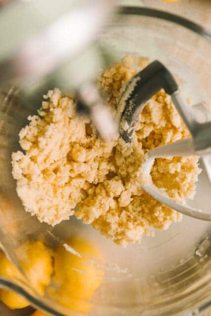 mixing ingredients together for lemon bar recipe