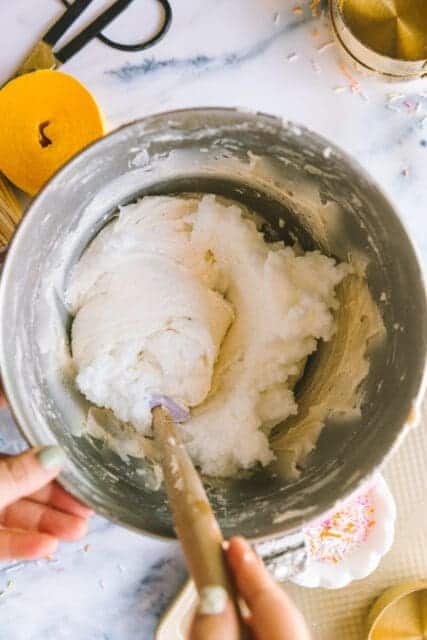 gently folding ingredients together for birthday cake recipes