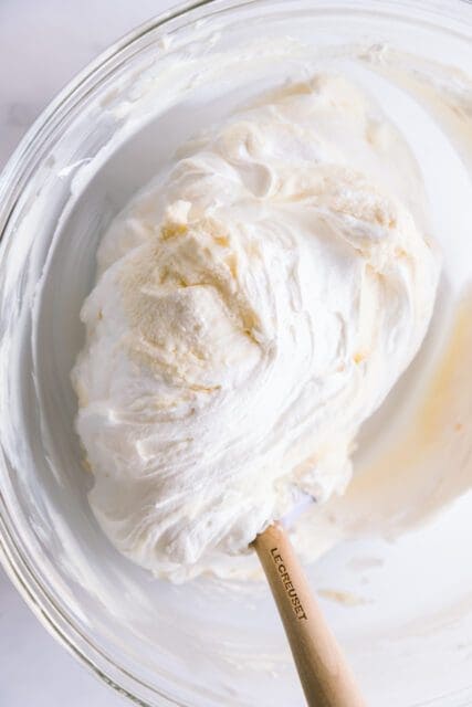 gently folding honey and chamomile into cream