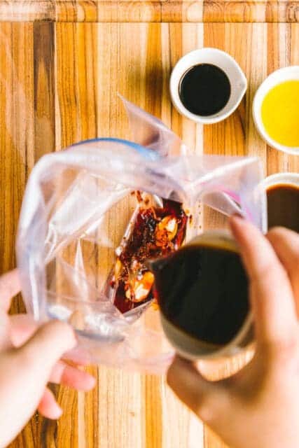 combining marinade ingredients for a French dip sandwich