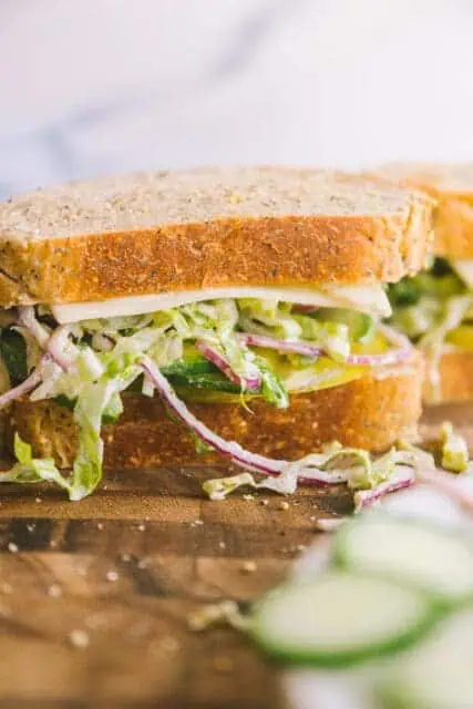 close up of green goddess tomato sandwich