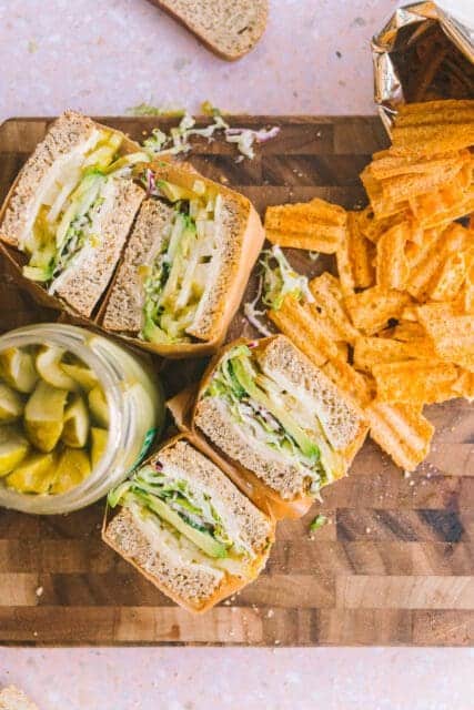 tomato sandwiches, wrapped and cut in half