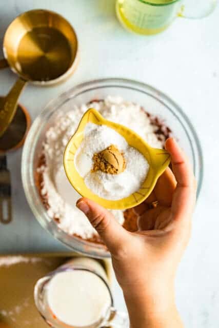 Add the salt, baking soda, baking powder, and that little bit of dried ginger to the dry mix