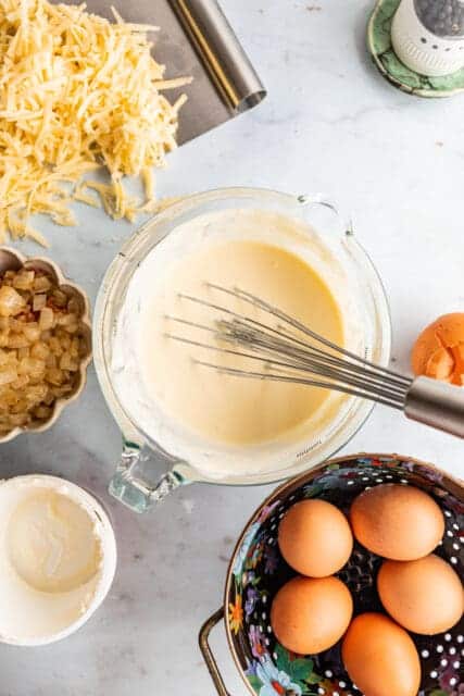 whisking eggs for quiche Lorraine
