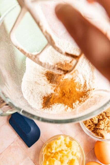 adding aromatic spices to the flour mixture