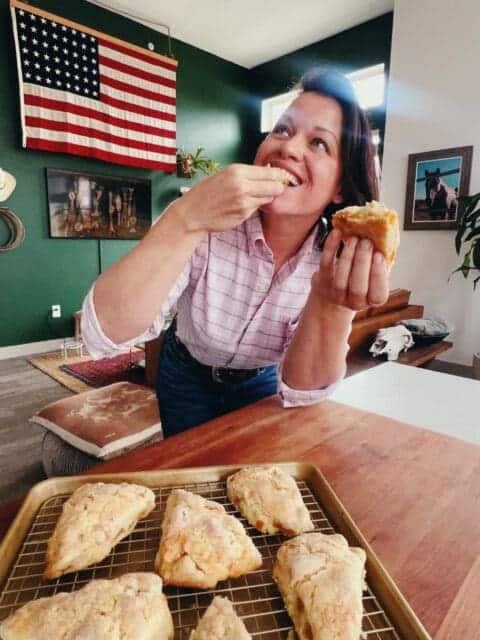 enjoying fresh apricot ginger scones, as one should