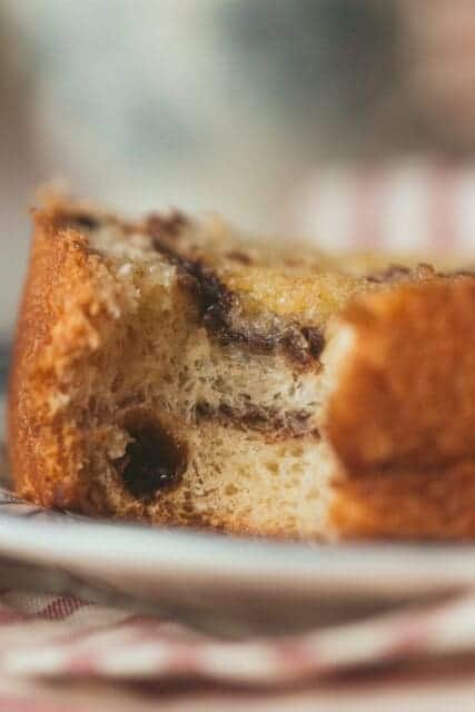 a cross section of cinnamon swirl inside the raisin bread